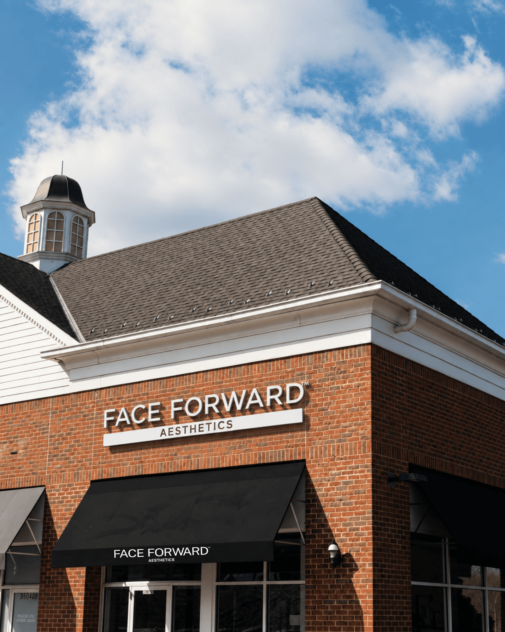 Face Forward Aesthetics clinic exterior with new signage